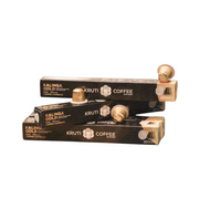Multiple packs of Kalinga Gold coffee capsules by Kruti Coffee, displayed against a neutral background.