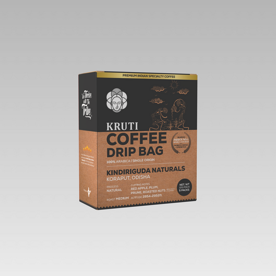 A packaged coffee drip bag labeled 'Kindiriguda Naturals' from Kruti Coffee with details about the product.