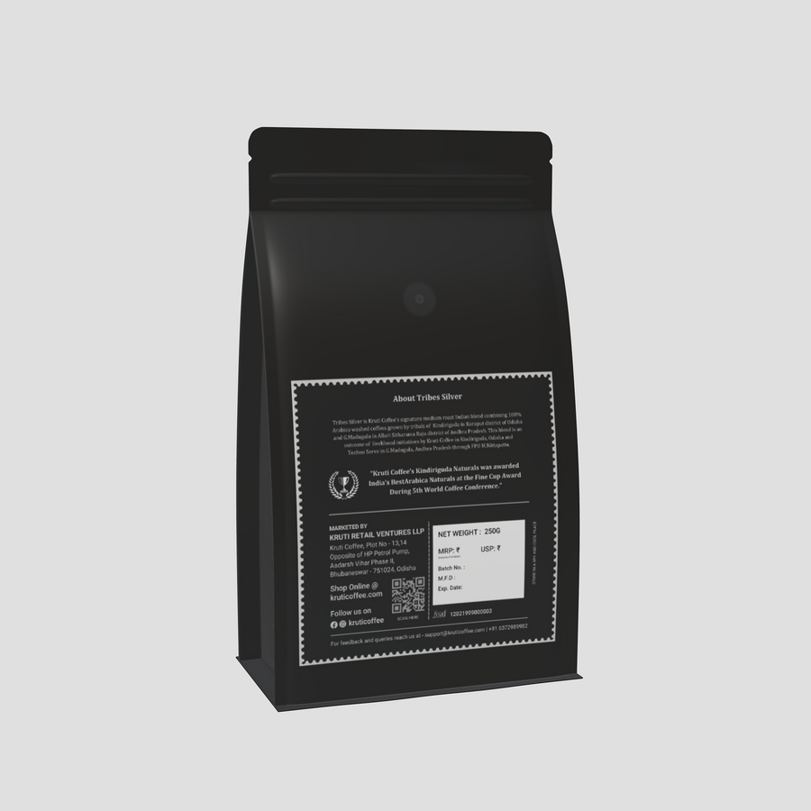 Tribes Silver Coffee Pack behind packaging displayed on a grey color background