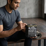 A person holding caffeine punch dip bag